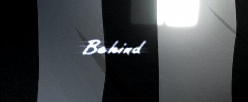behind
